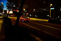 Night Ride — vintage red Chevrolet truck with Christmas tree, downtown night street scene by BLEEZnPHOTOGRAPHY